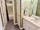 This bathroom features a single sink vanity and decorative mirror at 5200 W Shoreline Ter, Muncie, IN 47304