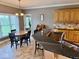 The kitchen features a breakfast bar with barstool seating and granite countertops at 5200 W Shoreline Ter, Muncie, IN 47304