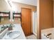 Bathroom featuring double sinks, neutral walls, shower and separate tub with chrome fixtures at 5361 Cradle River Ct, Indianapolis, IN 46221