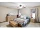 Comfortable bedroom with soft lighting, creating a serene and inviting atmosphere for restful nights at 5361 Cradle River Ct, Indianapolis, IN 46221