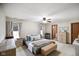 Spacious bedroom featuring neutral tones, ample natural light, and comfortable furnishings, creating a relaxing retreat at 5361 Cradle River Ct, Indianapolis, IN 46221