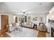 Bright and spacious living room with modern decor, hardwood floors, and a fireplace at 5361 Cradle River Ct, Indianapolis, IN 46221