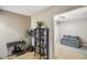 Bright living room with plush seating, carpeted floor, and display cabinet in view at 5361 Cradle River Ct, Indianapolis, IN 46221