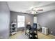 Office featuring neutral colored walls and carpet, ceiling fan and a window bringing in natural light at 5361 Cradle River Ct, Indianapolis, IN 46221