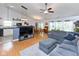 Spacious living room featuring hardwood floors, a comfortable couch, and plenty of natural light at 560 Old Farm Rd, Danville, IN 46122
