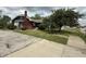 Charming bungalow featuring a mix of brick and siding exterior, set in a neighborhood at 5960 Southeastern Ave, Indianapolis, IN 46203