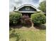 Charming bungalow home with updated colors and mature landscaping at 5960 Southeastern Ave, Indianapolis, IN 46203