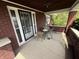 Relaxing covered porch with a swing, perfect for enjoying the outdoors at 5960 Southeastern Ave, Indianapolis, IN 46203