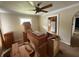 A bright room is filled with disassembled cabinets and wood furniture, ideal for customization at 5960 Southeastern Ave, Indianapolis, IN 46203