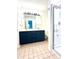 Charming bathroom with tiled floor, updated vanity with storage, and glass enclosed shower at 6143 Roberts Pl, Indianapolis, IN 46220