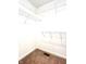 Ample storage available in this walk-in closet with wire shelving and carpet at 6143 Roberts Pl, Indianapolis, IN 46220