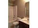 Bright bathroom features tub and shower combination with single sink vanity at 6304 El Paso St, Whitestown, IN 46075