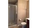 Neutral bathroom with glass shower, toilet and light paint at 6304 El Paso St, Whitestown, IN 46075