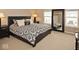 Bedroom with large mirror, two windows and neutral colors at 6304 El Paso St, Whitestown, IN 46075
