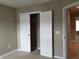 Bedroom with closet and connecting door at 6304 El Paso St, Whitestown, IN 46075