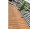Wooden deck with black metal railings overlooking neighborhood at 6304 El Paso St, Whitestown, IN 46075