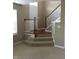 Inviting foyer with staircase and hardwood floors at 6304 El Paso St, Whitestown, IN 46075