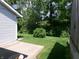 Spacious backyard featuring green lawn and patio at 6723 S New Jersey St, Indianapolis, IN 46227