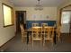 Dining room with wood table and chairs at 6723 S New Jersey St, Indianapolis, IN 46227