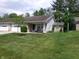 Charming single story home with a brick facade, attached garage, and a well-maintained lawn at 6723 S New Jersey St, Indianapolis, IN 46227
