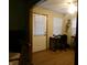 This home office features hardwood floor, and a work station at 6723 S New Jersey St, Indianapolis, IN 46227