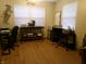 This home office features hardwood floor, two windows, and two work stations at 6723 S New Jersey St, Indianapolis, IN 46227