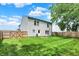 Large backyard features a wooden privacy fence, a grassy lawn and a well maintained lawn at 6809 Amber Springs Way, Indianapolis, IN 46237