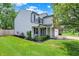 Two-story home with gray siding and well-manicured front yard at 6809 Amber Springs Way, Indianapolis, IN 46237