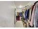 This walk-in closet features shelves, clothes racks and plenty of storage space at 6809 Amber Springs Way, Indianapolis, IN 46237