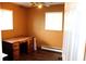 Bedroom featuring hardwood floors, two windows offering great natural light, and ceiling fan at 706 Bobs Ct, Beech Grove, IN 46107