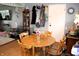 Cozy dining area featuring a wooden table, chairs, and ample natural light at 706 Bobs Ct, Beech Grove, IN 46107