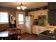 Functional kitchen features white cabinetry, neutral countertops, and modern appliances, complete with an eat-in dining area at 706 Bobs Ct, Beech Grove, IN 46107