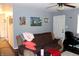 Cozy living room featuring neutral walls, comfortable seating, and wood-look flooring at 706 Bobs Ct, Beech Grove, IN 46107