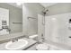 This bathroom features a shower over tub and sink at 714 Thornburg Pkwy, Brownsburg, IN 46112