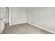 The carpeted bedroom offers access to other rooms at 714 Thornburg Pkwy, Brownsburg, IN 46112