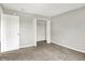 Bedroom featuring gray walls, carpet floors, and open closet at 714 Thornburg Pkwy, Brownsburg, IN 46112