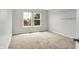 Neutral bedroom with carpet, large windows and shelving at 714 Thornburg Pkwy, Brownsburg, IN 46112