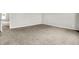 This carpeted bedroom provides access to another room at 714 Thornburg Pkwy, Brownsburg, IN 46112