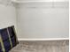 A look inside a closet with basic wire shelving and neutral carpet at 714 Thornburg Pkwy, Brownsburg, IN 46112