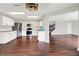 Modern kitchen with stainless steel appliances and granite countertops that opens to a spacious dining area at 714 Thornburg Pkwy, Brownsburg, IN 46112