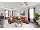 Cozy living room with comfortable seating, elegant decor, and ample natural light at 714 Thornburg Pkwy, Brownsburg, IN 46112