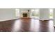 Bright living room with fireplace and access to backyard and pool at 714 Thornburg Pkwy, Brownsburg, IN 46112