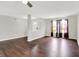Spacious living room featuring sleek hardwood floors and plenty of natural light at 714 Thornburg Pkwy, Brownsburg, IN 46112