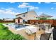 Backyard with in-ground pool and patio furniture for outdoor relaxation at 714 Thornburg Pkwy, Brownsburg, IN 46112