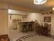 Cozy basement area with wet bar, dining area, and comfortable seating at 7440 Sylvan Ridge Rd, Indianapolis, IN 46240