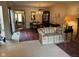 Comfortable living room with fireplace and dining area, ideal for relaxing and entertaining at 7440 Sylvan Ridge Rd, Indianapolis, IN 46240