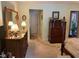 Traditional bedroom featuring neutral carpet, stylish furniture, and plenty of natural light at 7440 Sylvan Ridge Rd, Indianapolis, IN 46240
