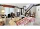 Living room with carpeted floors, classic decor, and staircase at 7587 Winding Way, Fishers, IN 46038
