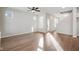 Bright and spacious living room with hardwood floors and large windows allowing plenty of natural light at 786 James William Ln, Westfield, IN 46074