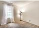 Bright bedroom featuring large window and carpeted floors at 9118 Hardwood Ct, Indianapolis, IN 46250